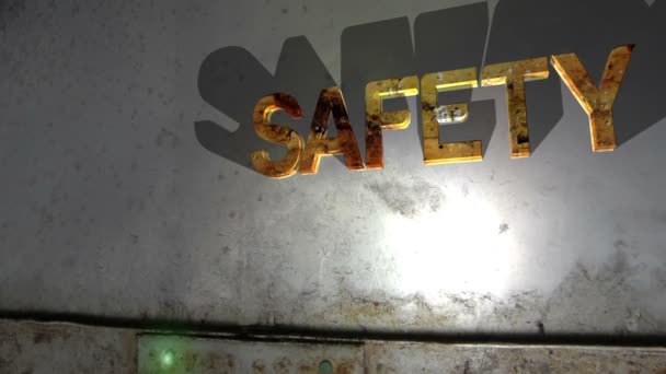 Grunge safety text on the wall — Stock Video