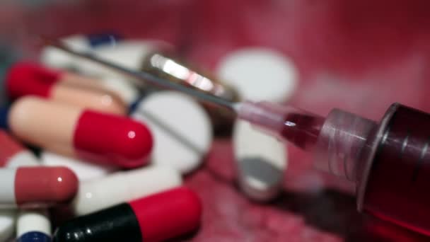 Syringe And Pills Drug Addiction Concept — Stock Video