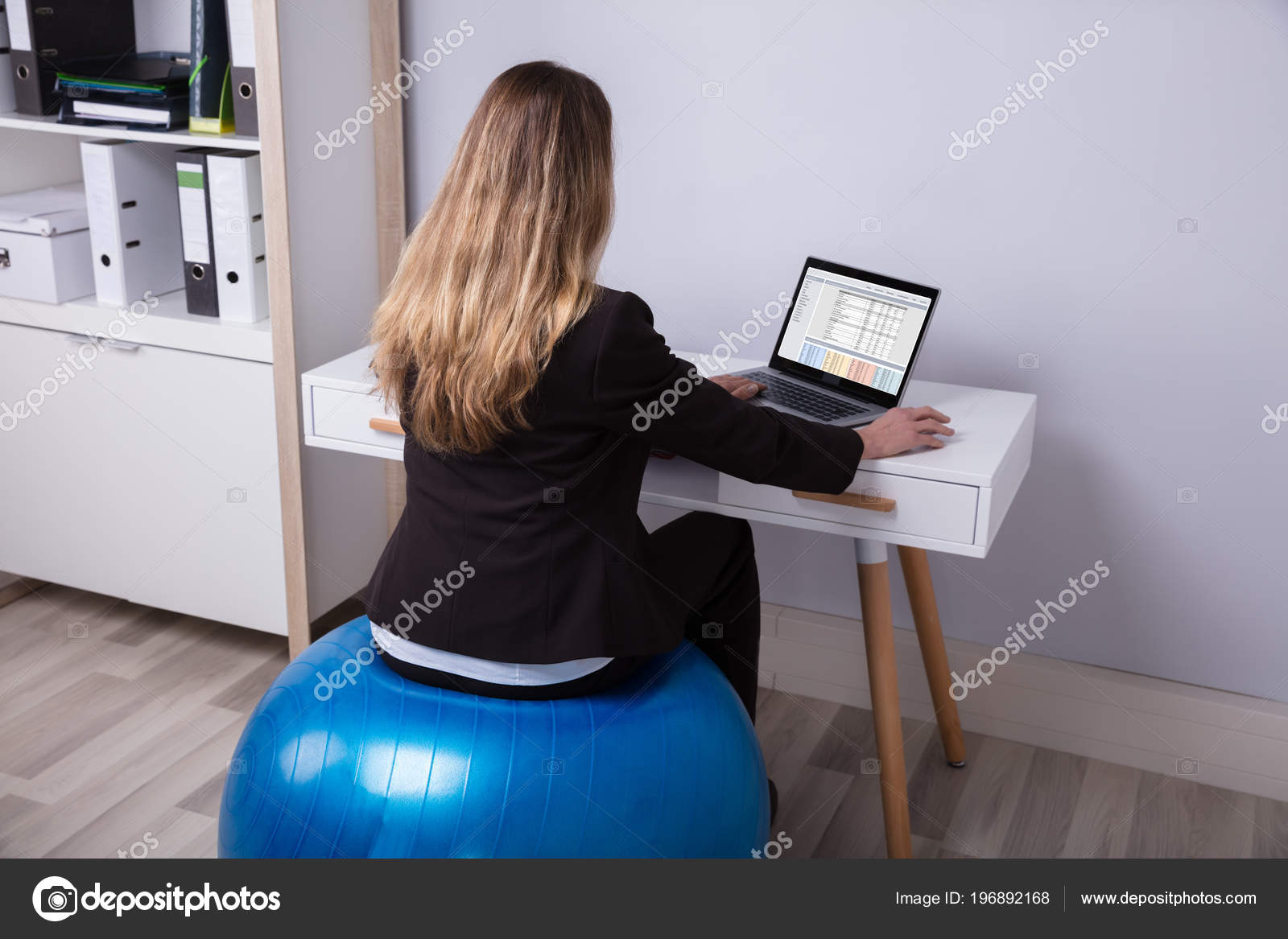 Rear View Businesswoman Sitting Fitness Ball Working Office