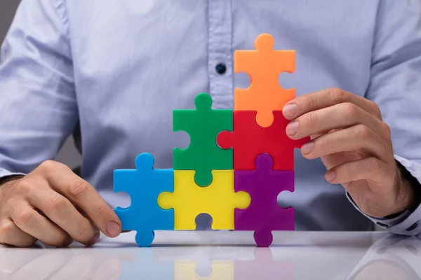 Person Hand Building Staircase Multicolored Jigsaw Puzzle — Stock Photo, Image