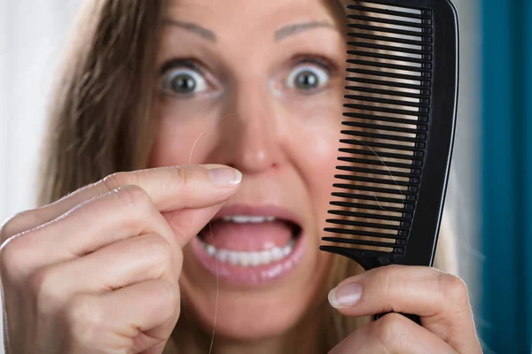 Shocked Woman Suffering Hair Loss Problem — Stock Photo, Image