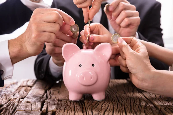 Crowdfunding Concept People Inserting Coins Piggybank — Stock Photo, Image