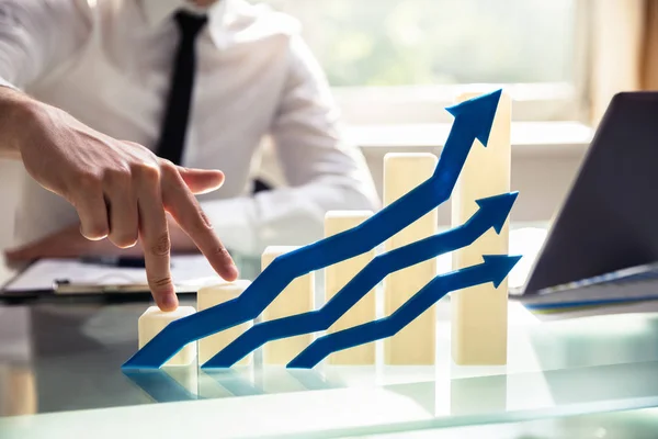 Businessperson Finger Climbing Increasing Graph Blue Arrow Showing Upward Direction — Stock Photo, Image