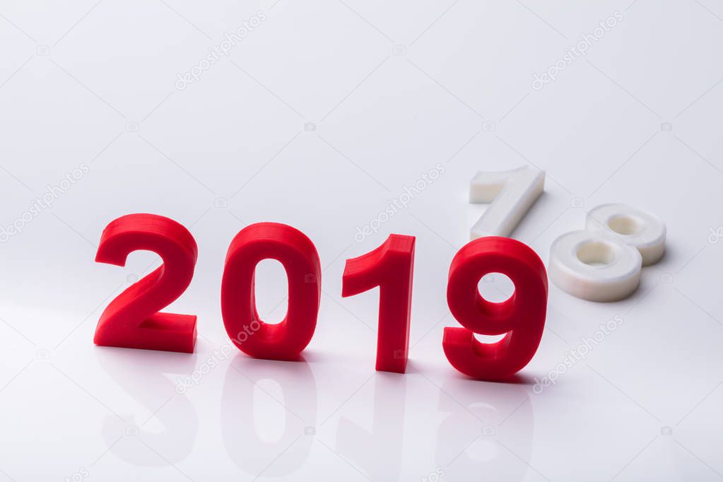 Year 2019 Replaced With Old Year 2018 Over Reflective Background