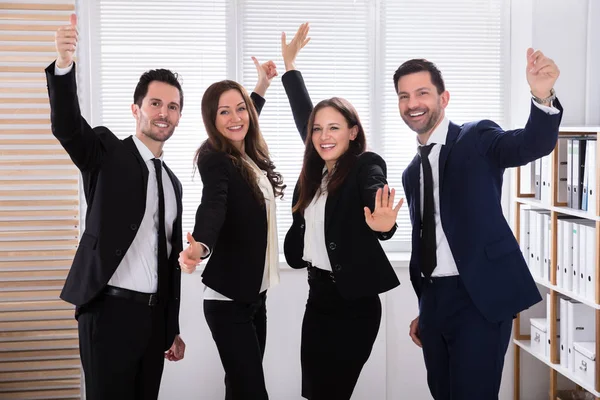 Portrait Excited Young Businesspeople Raising Arms — Stock Photo, Image