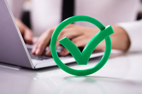 Close Green Check Mark Sign Front Businessperson Using Laptop — Stock Photo, Image
