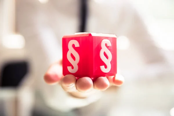 Close Dari Person Hand Holding Red Cubic Block Dengan Simbol — Stok Foto