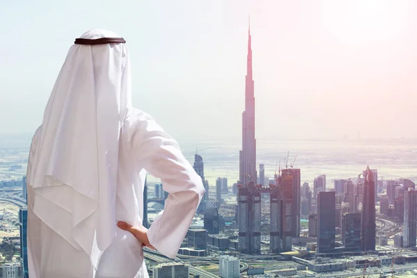 Rear View Arabic Man Outstretching His Hand Modern Buildings Dubai — Stock Photo, Image