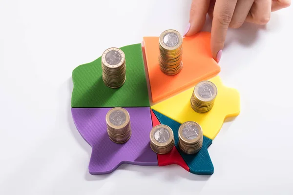 Woman Hand Placing Last Piece Multi Colored Piggybank Stacked Coins — Stock Photo, Image