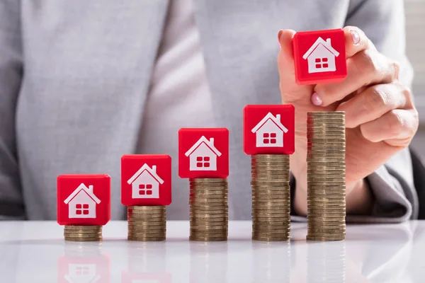 Close Businesswoman Hand Placing Red Cubic Block House Icon Stacked — Stock Photo, Image