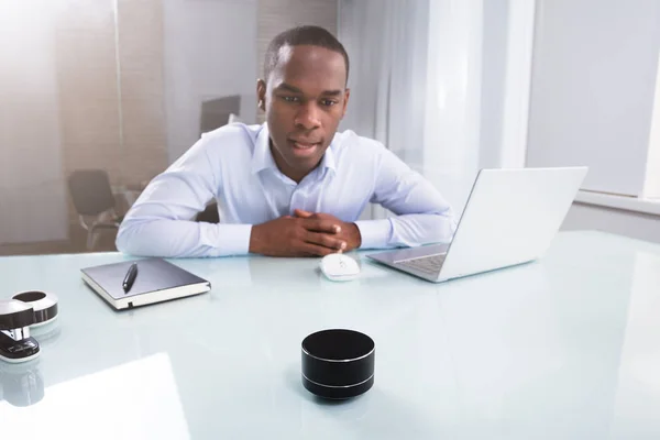 Close Young Businessman Speaking Wireless Speaker Workplace — Stock Photo, Image
