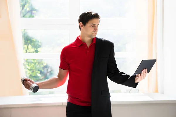 Young Businessman Picking Calculator Dumbbell Simultaneously Office — Stock Photo, Image