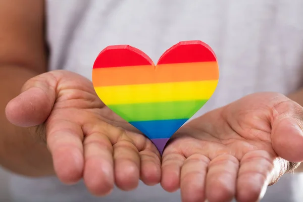 Close Man Hand Holding Rainbow Lgbt Heart — Stock Photo, Image