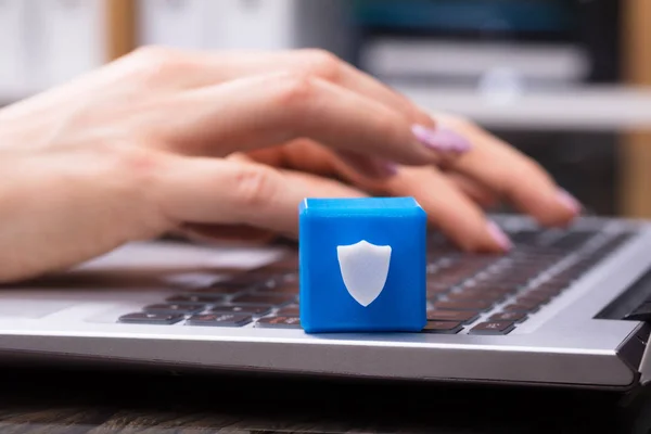 Businesswoman Hand Working Laptop Cubic Block Showing Security Shield Symbol — Stock Photo, Image