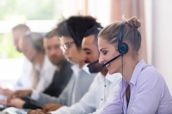 Young Customer Service Executives Using Earphones Working Call Center — Stock Photo, Image