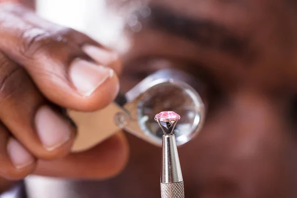 Close Jeweler Examining Diamond Loupe — Stock Photo, Image