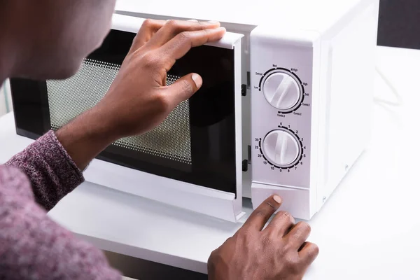 Close Man Pressing Button Microwave Oven — Stock Photo, Image