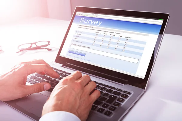 Close Businessman Hand Filling Online Survey Form Laptop — Stock Photo, Image