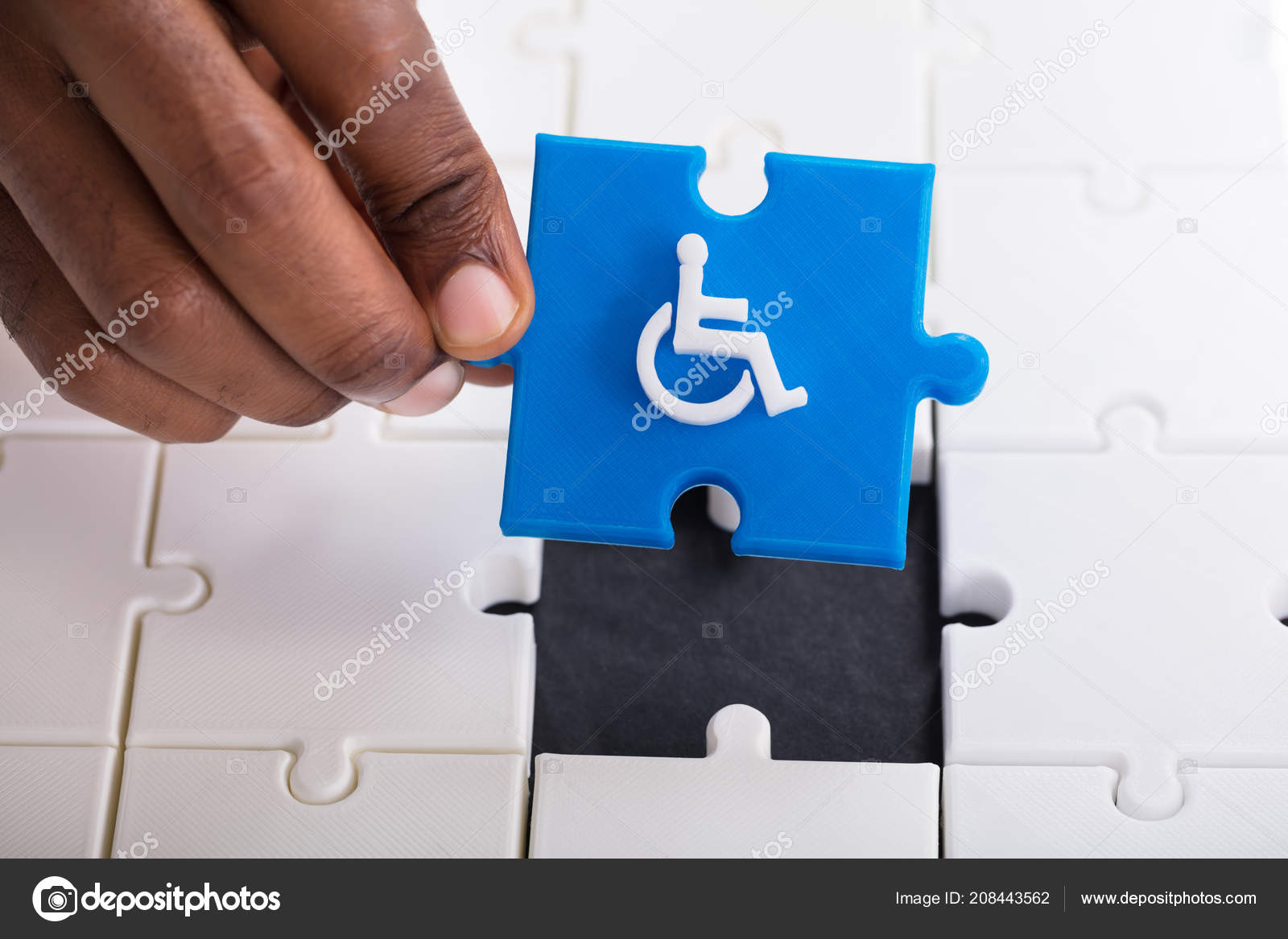 Person's Hand Holding Piece Blue Jigsaw Puzzle Disabled Wheelchair Icon