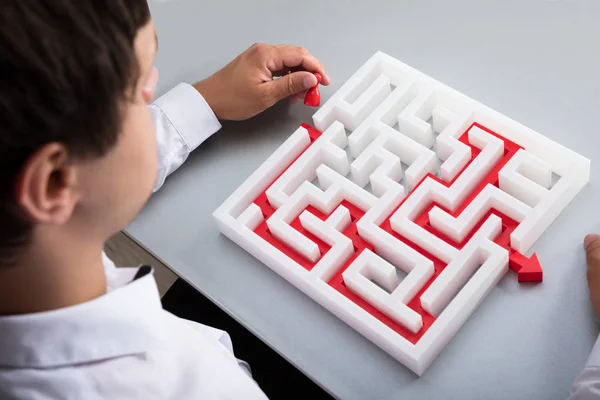 Elevated View Businessman Solving Maze Desk — Stock Photo, Image