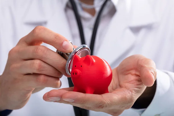 Close Doctor Hand Examining Piggybank Stethoscope — Stock Photo, Image