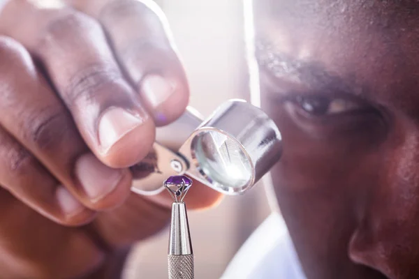 Close Jeweler Examining Diamond Loupe — Stock Photo, Image