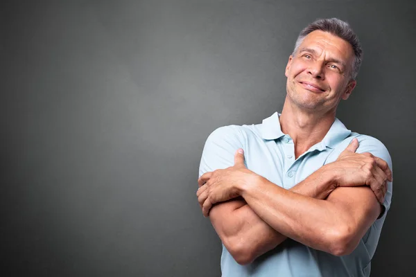 Portrait Mature Man Hugging Himself Grey Background — Stock Photo, Image