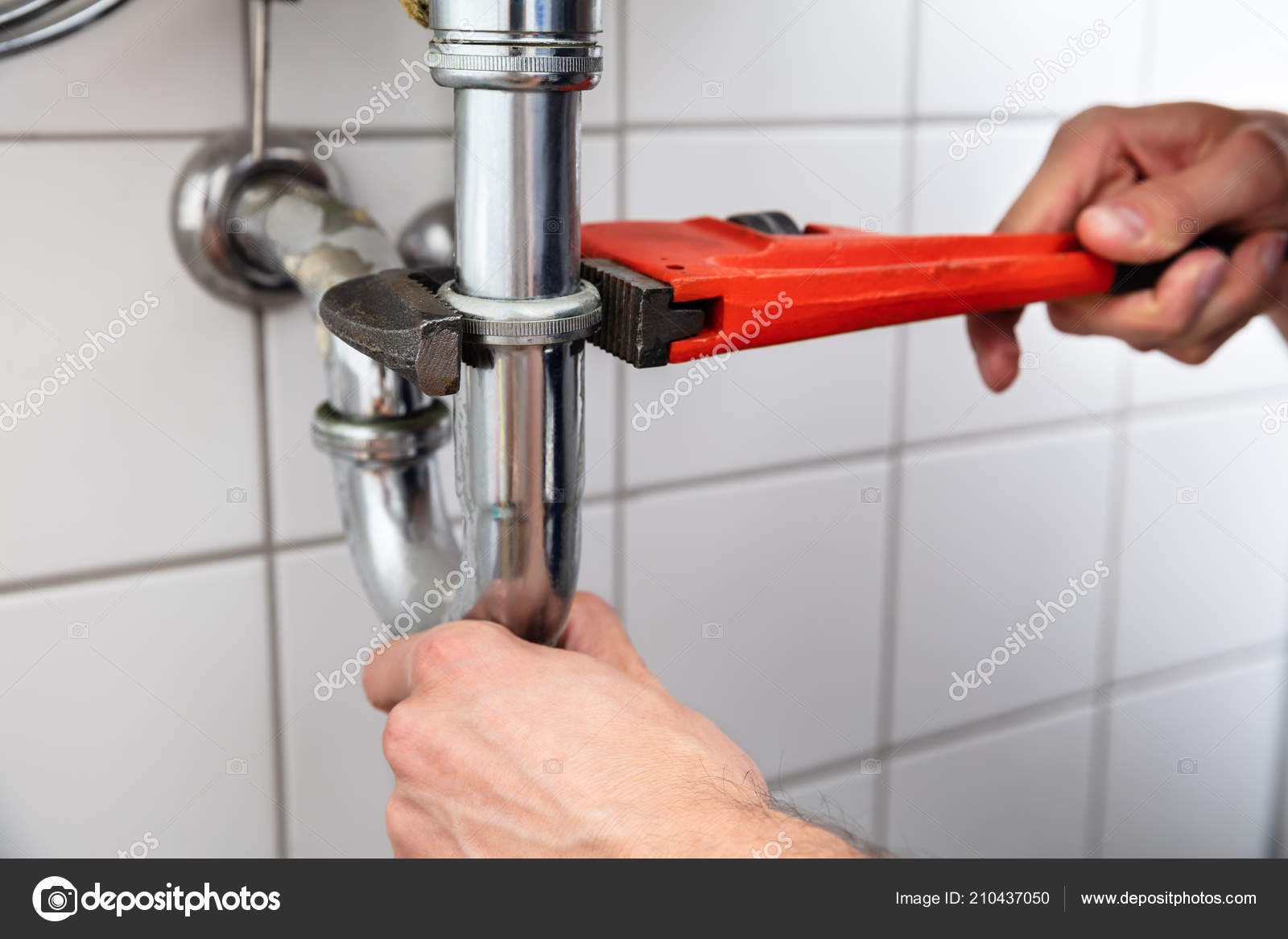 Close Plumber Hand Repairing Sink Adjustable Wrench — Stock Photo