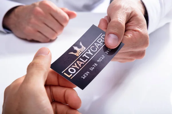 Close Businessman Hand Giving Loyalty Card His Partner — Stock Photo, Image