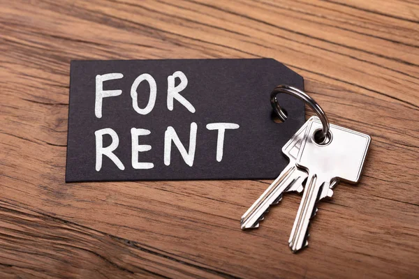 Close Rented House Keys Wooden Table — Stock Photo, Image