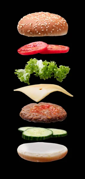 黒い背景にハンバーガーの食材をクローズ アップ — ストック写真
