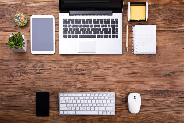 Overhead View Office Supplies Electronic Gadgets Wooden Desk — Stock Photo, Image