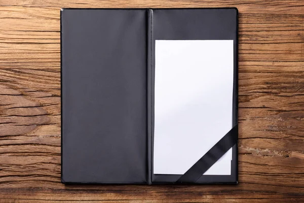 Overhead View Blank Empty White Paper Black Leather Folder Wooden — Stock Photo, Image