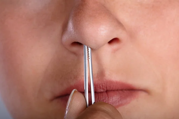 Close Woman Plucking Her Nose Hair Tweezers — Stock Photo, Image