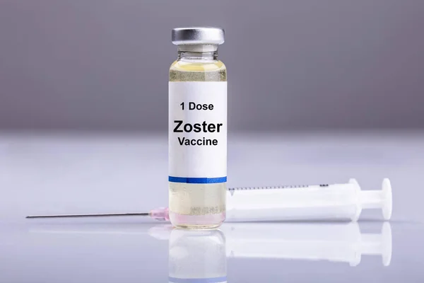 Zoster Vaccine Bottle Syringe Reflective Background — Stock Photo, Image