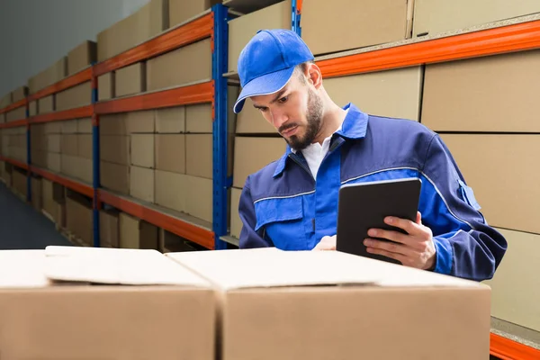 Young Delivery Man Uniform Checking His Package Digital Tablet — Stock Photo, Image