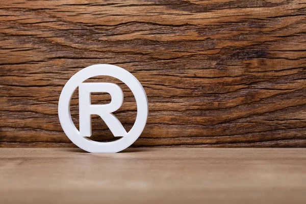 Registered Trademark Sign Front Wooden Wall — Stock Photo, Image