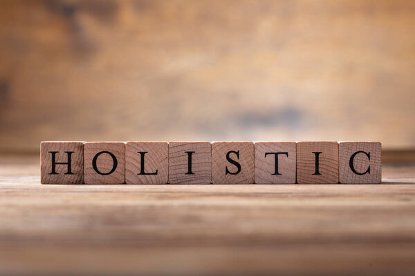 Photo Of Holistic Wooden Blocks On Wooden Desk