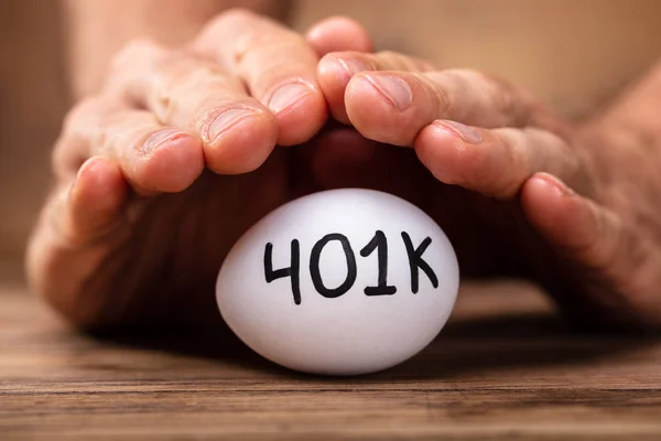 Close Man Hand Protecting 401K White Egg — Stock Photo, Image