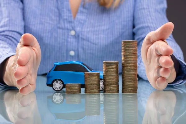 Businesswoman Hand Protecting Growing Stacked Coins Blue Car Desk — Stock Photo, Image