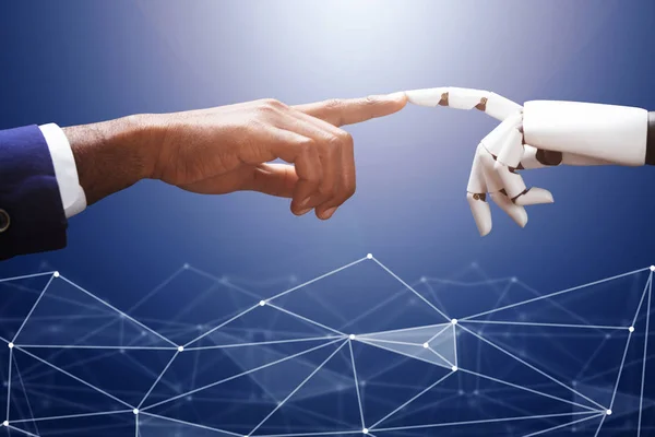 商人触摸机器人手指在未来主义背景 — 图库照片