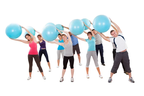 Grupo Personas Haciendo Ejercicio Con Bolas Fitness Sobre Fondo Blanco — Foto de Stock