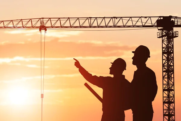 Silhouette Architect Showing Something His Partner Construction Site — Stock Photo, Image