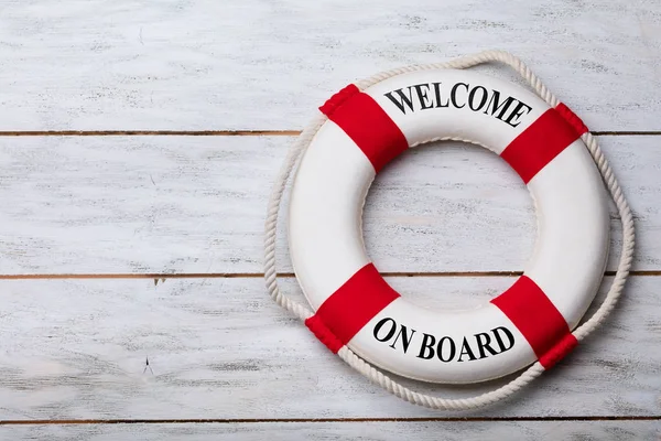 Elevated View Lifebuoy Welcome Text Wooden Plank — Stock Photo, Image