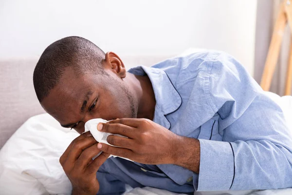 Close Young African Man Blowing His Nose — Stock Photo, Image