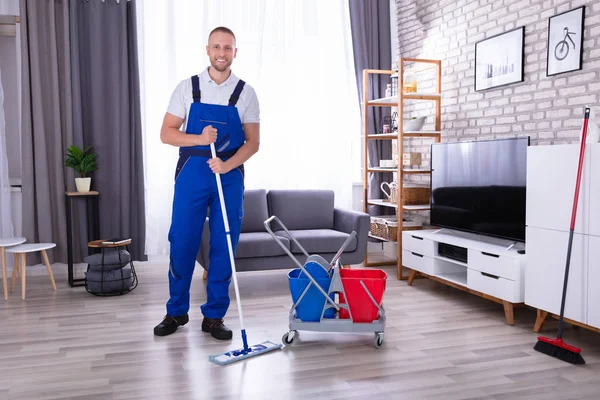 Portrait Happy Male Janitor Standing Living Room — Stok Foto