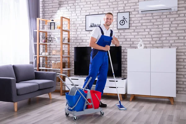 Portrait Happy Male Janitor Standing Living Room — Stock Photo, Image