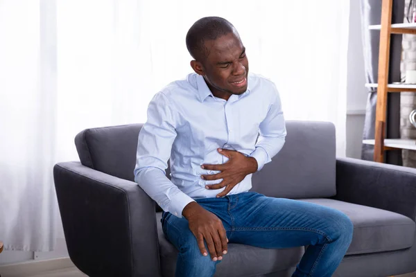 Close Young African Man Pain Holding His Stomach — Stock Photo, Image