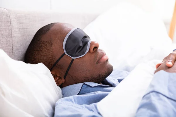 Close Young African Man Sleeping Sleep Mask — Stock Photo, Image