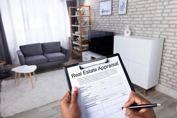 Close Man Hand Filling Real Estate Appraisal Form Pen — Stock Photo, Image